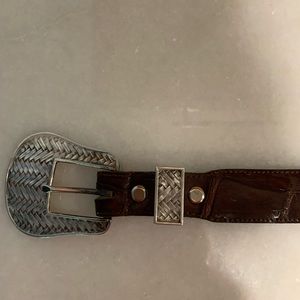Silver buckle, alligator leather, Western belt.